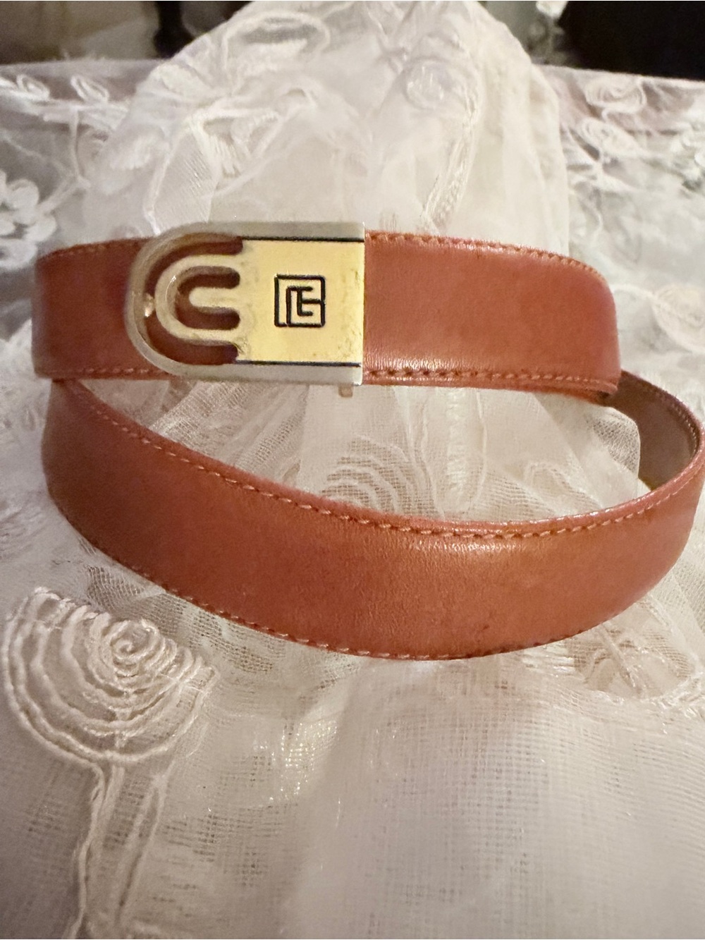 Pierre Cardin 39” Tan leather belt featuring their iconic "P" logo